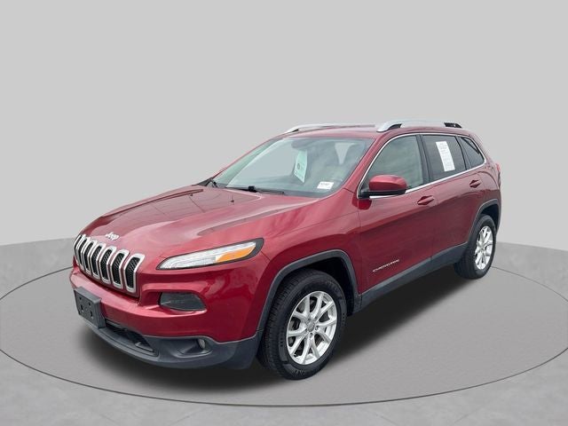2015 Jeep Cherokee Latitude in Deep Cherry Red Crystal Pearlcoat — front three-quarter view
