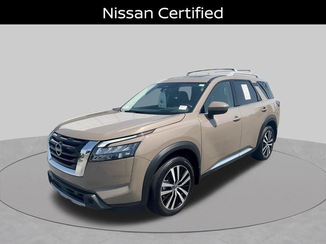 2025 Nissan Pathfinder Platinum in Baja Storm — front three-quarter view