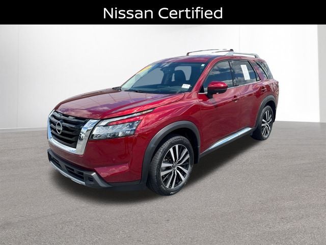 2024 Nissan Pathfinder Platinum in Scarlet Ember — front three-quarter view