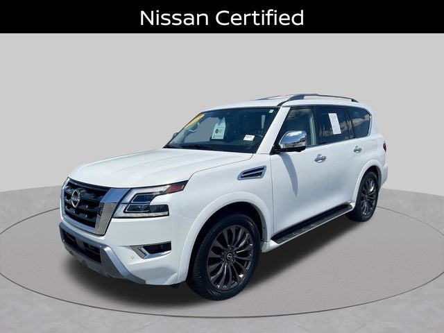 2023 Nissan Armada Platinum in Aspen White Tricoat — front three-quarter view