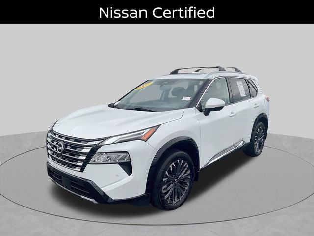 2025 Nissan Rogue Platinum in Everest White Pearl — front three-quarter view